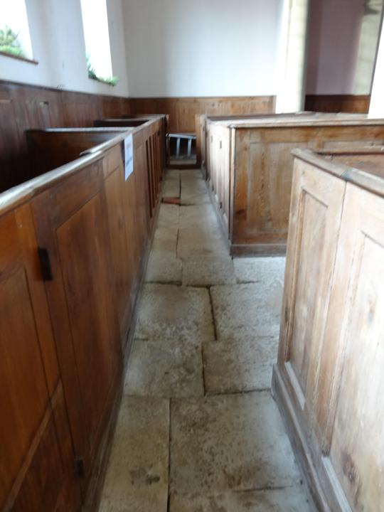 Uneven flooring in South Aisle